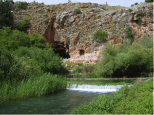 The cave in present times, waters flowing from underground